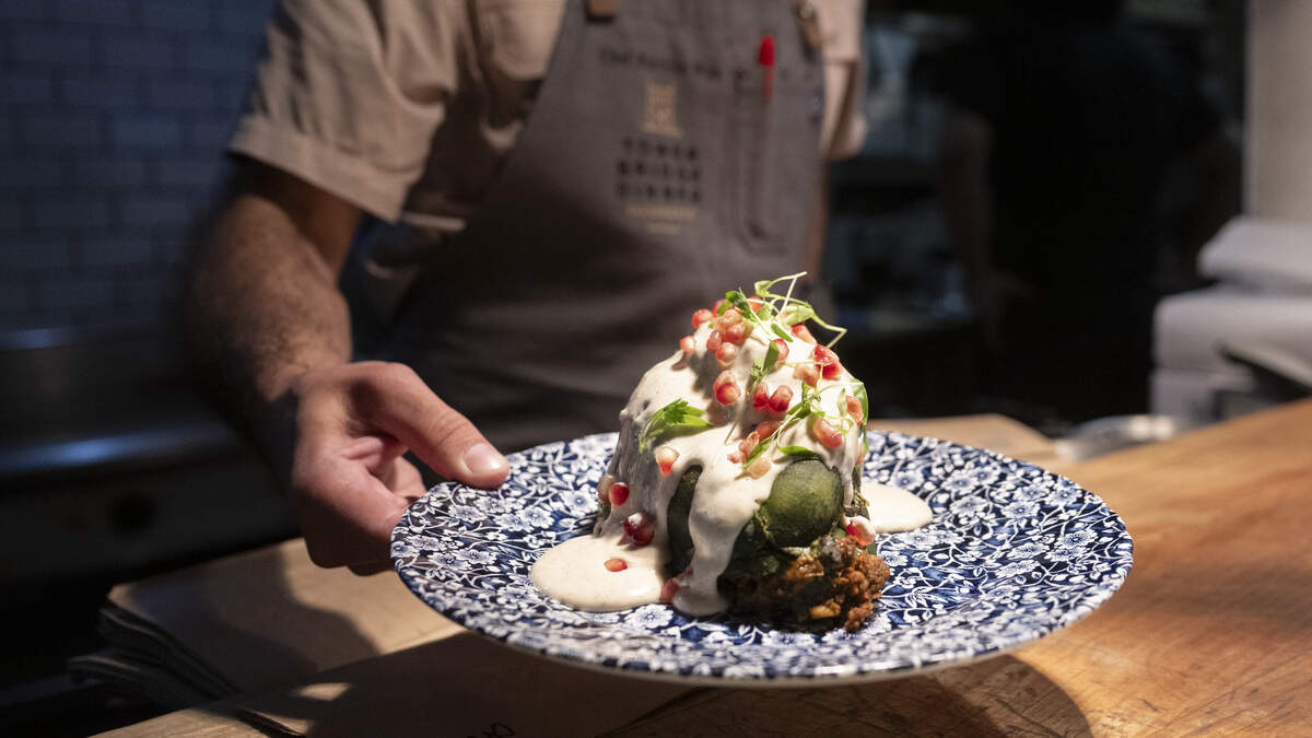 Chef Patricio Wise, owner and proprietor of Nixtaco Mexican Kitchen & Distillery, serves chiles en nogada, a Mexican dish popular around Mexican Independence Day, at his Roseville restaurant on Wednesday, Sept. 16, 2026.